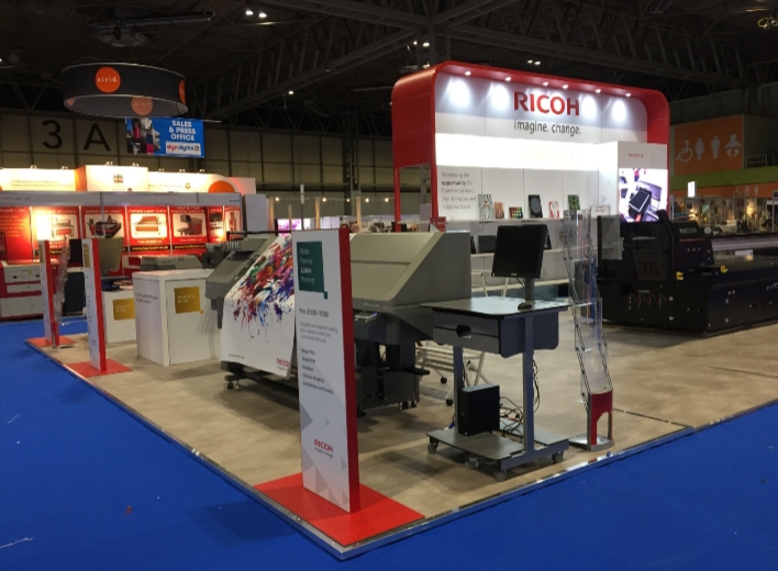 image of Ricoh stand at sign and digital